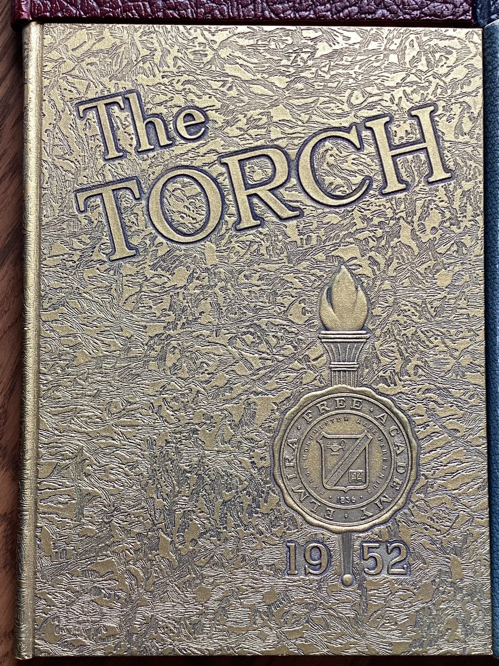 The Torch Hardcover Yearbook Set - Red, Black, Gold, Light Blue. EFA
